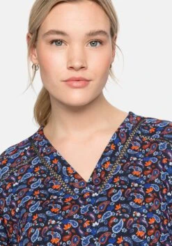 Sheego Shirtkleid Mit Paisleydruck Und Lochspitze 11 Sheego Shirtkleid Mit Paisleydruck Und Lochspitze -Shego Kleidung Geschaft 14382300524 04BGP 02 SH